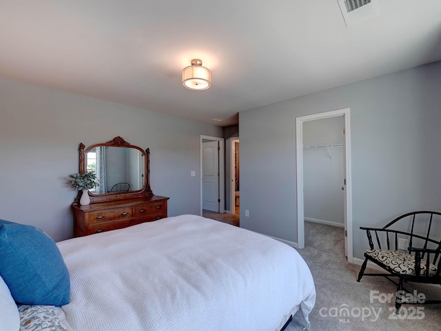 1324 Mona Vale Dr, Huntersville, NC 28078 - bedroom featuring light colored carpet and a spacious closet