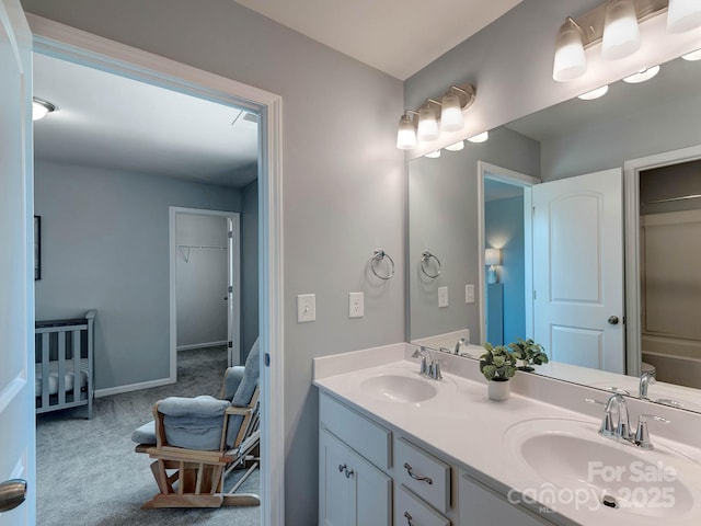 1324 Mona Vale Dr, Huntersville, NC 28078 - full bathroom featuring double vanity and baseboards
