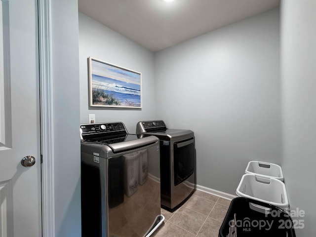 1324 Mona Vale Dr, Huntersville, NC 28078 - laundry area with washer and dryer and light tile patterned floors