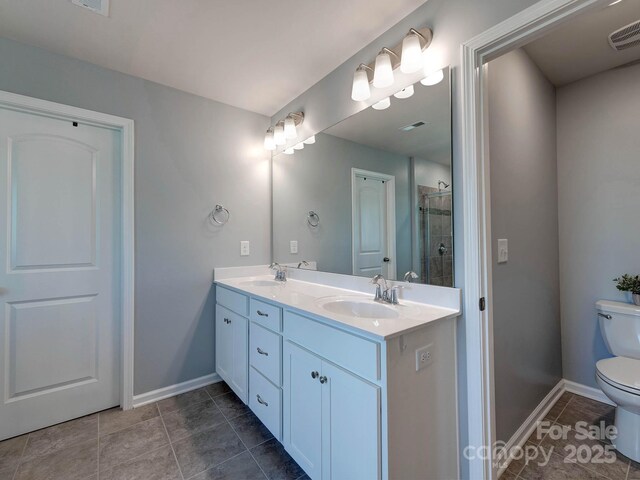 1324 Mona Vale Dr, Huntersville, NC 28078 - bathroom with double vanity, a stall shower, and tile patterned flooring