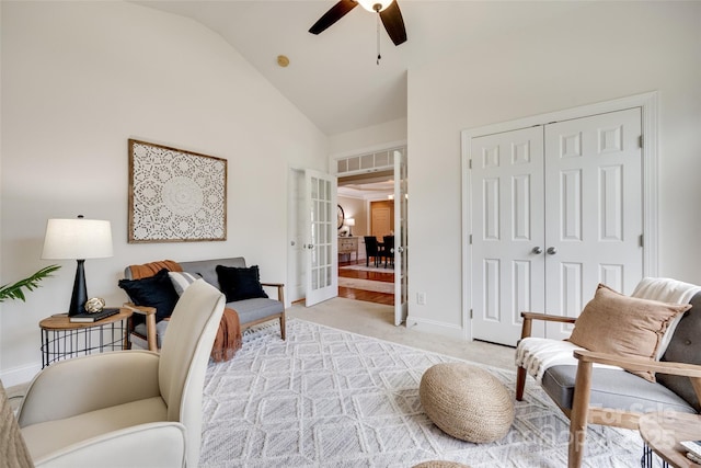 3905 Hounslow Ln, Harrisburg, NC 28075 - living room featuring ceiling fan, vaulted ceiling, light colored carpet, and french doors