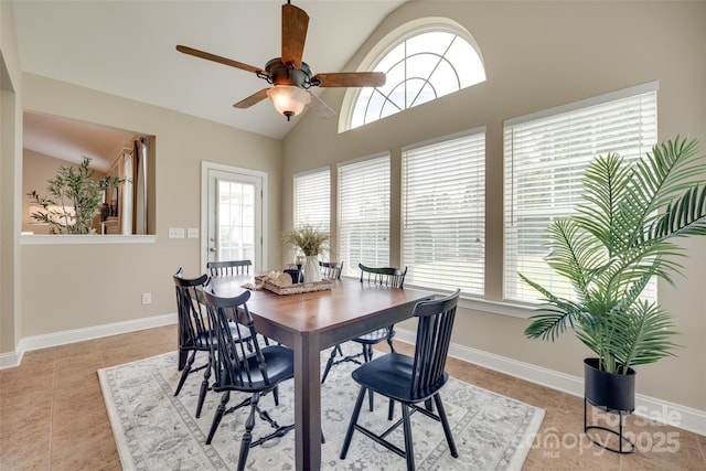3905 Hounslow Ln, Harrisburg, NC 28075 - dining area featuring healthy amount of natural light, light tile patterned floors, ceiling fan, and lofted ceiling