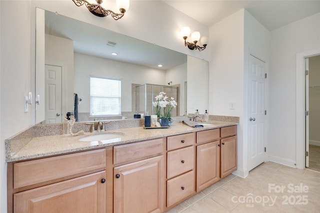 3905 Hounslow Ln, Harrisburg, NC 28075 - full bath featuring a shower stall, double vanity, and tile patterned flooring