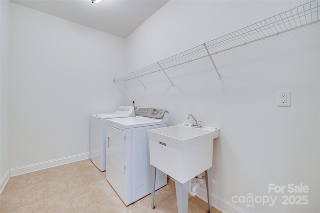 3905 Hounslow Ln, Harrisburg, NC 28075 - washroom with washing machine and clothes dryer and baseboards