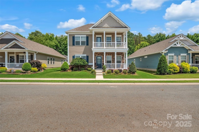 282 Harrison Ln, Locust, NC 28097 - neoclassical / greek revival house featuring covered porch, a front lawn, and stone siding
