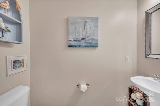 282 Harrison Ln, Locust, NC 28097 - half bathroom with toilet and a sink