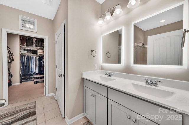 282 Harrison Ln, Locust, NC 28097 - full bath with double vanity, a spacious closet, and tile patterned floors