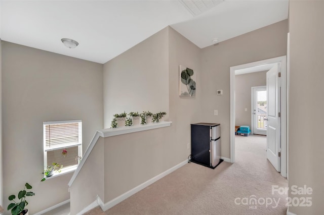 282 Harrison Ln, Locust, NC 28097 - hallway featuring carpet floors and an upstairs landing