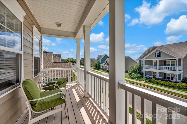282 Harrison Ln, Locust, NC 28097 - balcony with a residential view and a baseboard heating unit