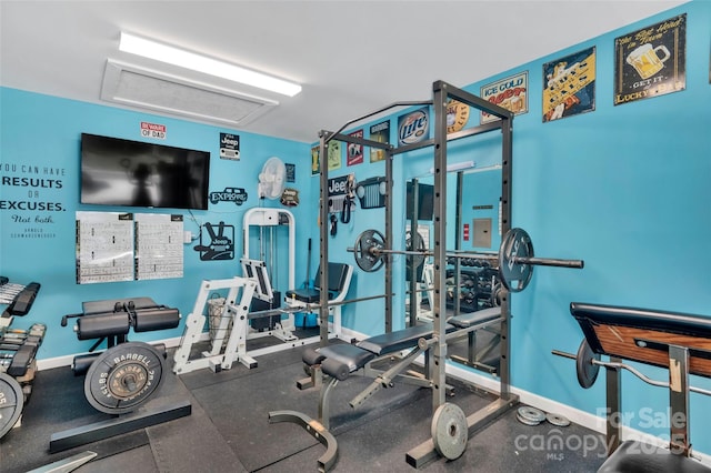 282 Harrison Ln, Locust, NC 28097 - exercise room with baseboards