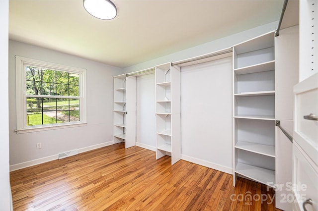 1036 11th Street Circle Dr NW, Hickory, NC 28601 - spacious closet featuring light wood-style floors