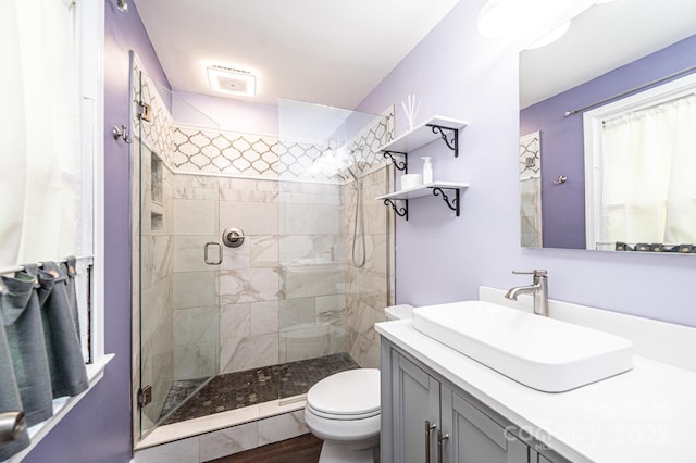 1036 11th Street Circle Dr NW, Hickory, NC 28601 - bathroom with a stall shower, vanity, and wood finished floors