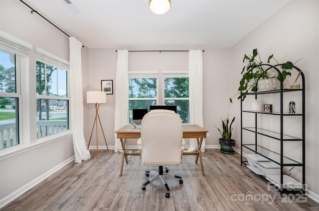 5499 Angus Dr, Midland, NC 28107 - office space featuring wood finished floors and plenty of natural light