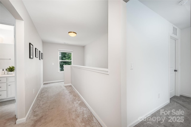 5499 Angus Dr, Midland, NC 28107 - hallway featuring carpet flooring and an upstairs landing