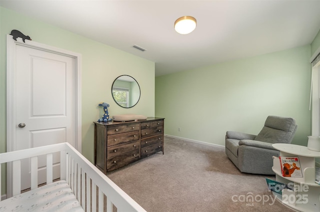 5499 Angus Dr, Midland, NC 28107 - carpeted bedroom with a nursery area and baseboards