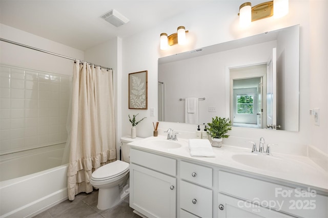 5499 Angus Dr, Midland, NC 28107 - full bathroom featuring double vanity, tile patterned flooring, and shower / tub combo