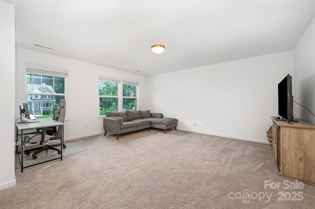 5499 Angus Dr, Midland, NC 28107 - living room with light carpet and an office area