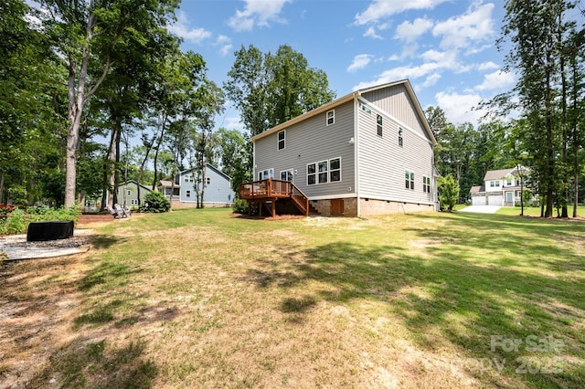 5499 Angus Dr, Midland, NC 28107 - back of property featuring crawl space, a deck, a lawn, and stairs