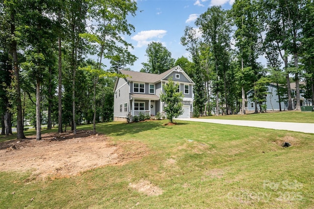 5499 Angus Dr, Midland, NC 28107 - view of front facade featuring an attached garage, concrete driveway, and a front lawn