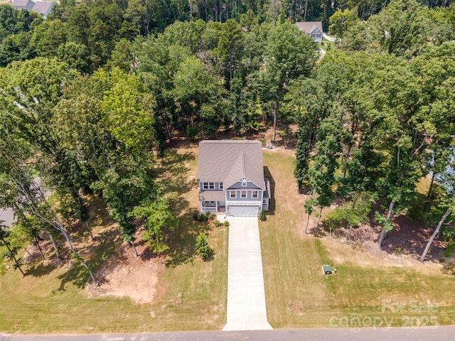 5499 Angus Dr, Midland, NC 28107 - aerial view of property and surrounding area with a forest