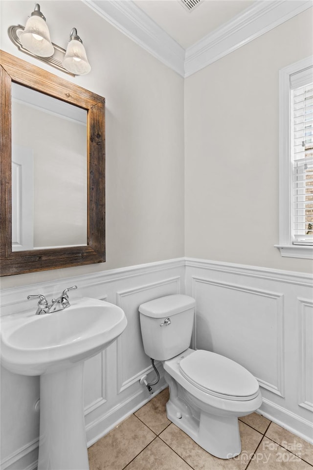 1011 Wadsworth Ln, Indian Trail, NC 28079 - bathroom featuring ornamental molding, tile patterned floors, and wainscoting