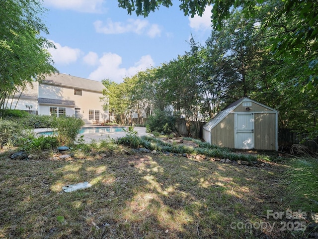 16411 Greybriar Forest Ln, Charlotte, NC 28278 - view of yard featuring a shed and an outdoor pool