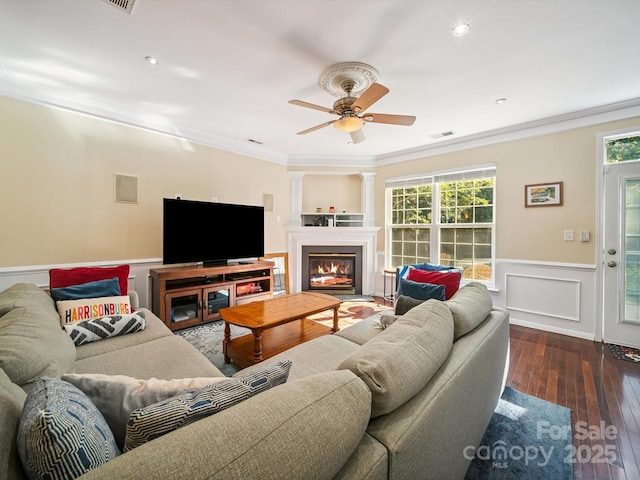 16411 Greybriar Forest Ln, Charlotte, NC 28278 - living room featuring ornamental molding, a ceiling fan, wainscoting, hardwood / wood-style flooring, and healthy amount of natural light