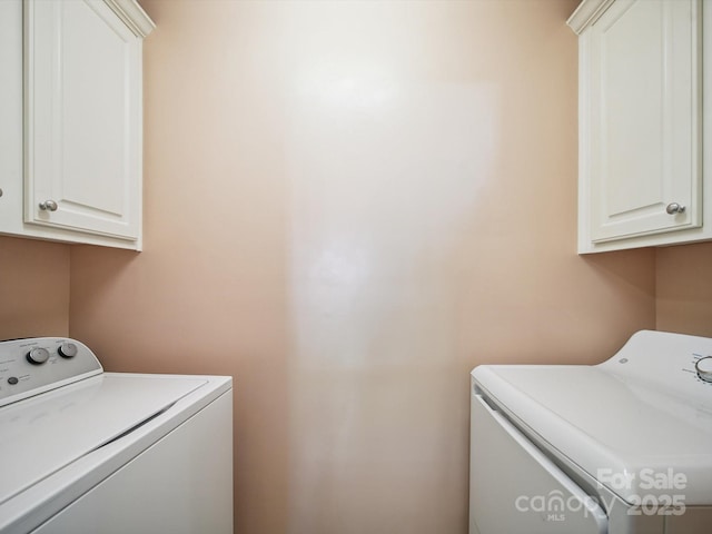 16411 Greybriar Forest Ln, Charlotte, NC 28278 - washroom with cabinet space and washing machine and dryer