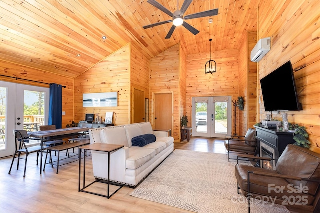7025 Martin Ln, Morganton, NC 28655 - living area with french doors, wood ceiling, healthy amount of natural light, wood walls, and an AC wall unit