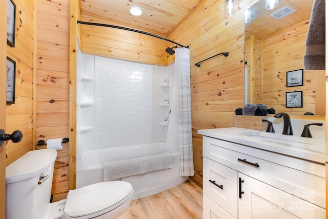 7025 Martin Ln, Morganton, NC 28655 - full bath featuring wooden walls, wood finished floors, vanity, shower / tub combo, and wooden ceiling