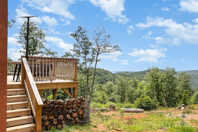 7025 Martin Ln, Morganton, NC 28655 - view of yard featuring stairway, a deck, and a wooded view