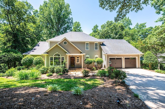 841 16th Avenue Ln NW, Hickory, NC 28601 - view of front of house featuring an attached garage, driveway, and a shingled roof