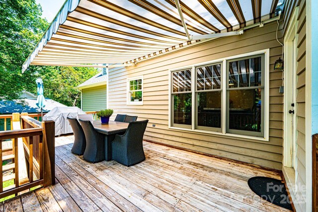 841 16th Avenue Ln NW, Hickory, NC 28601 - wooden deck with outdoor dining area and area for grilling