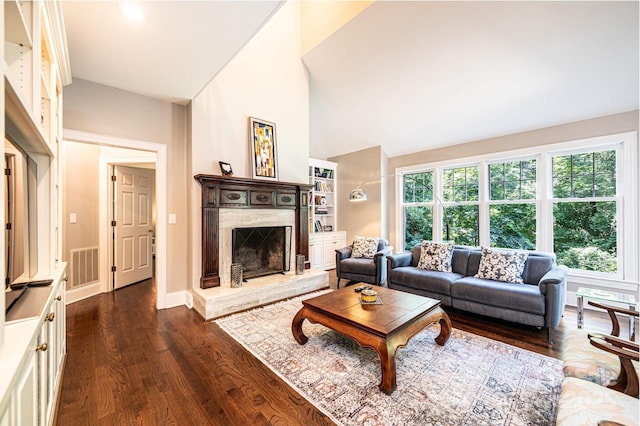 841 16th Avenue Ln NW, Hickory, NC 28601 - living room with dark wood-type flooring, lofted ceiling, and a premium fireplace