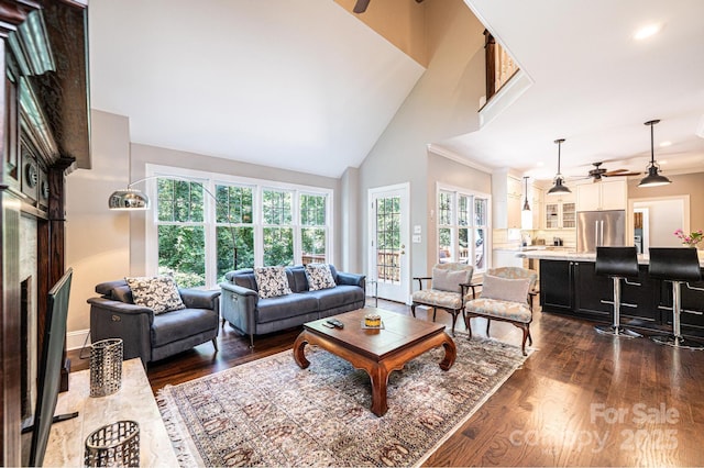 841 16th Avenue Ln NW, Hickory, NC 28601 - living room with a ceiling fan, a fireplace, dark wood-style flooring, a towering ceiling, and recessed lighting