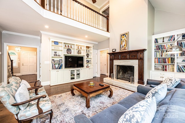841 16th Avenue Ln NW, Hickory, NC 28601 - living area featuring a high ceiling, a high end fireplace, ornamental molding, stairway, and dark wood-type flooring
