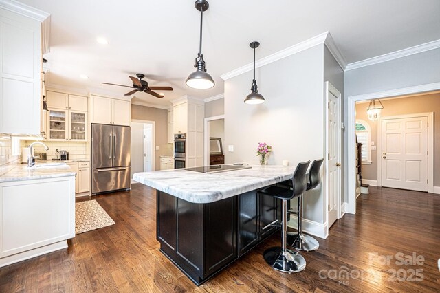 841 16th Avenue Ln NW, Hickory, NC 28601 - kitchen with appliances with stainless steel finishes, a peninsula, crown molding, ceiling fan, and dark wood-style flooring