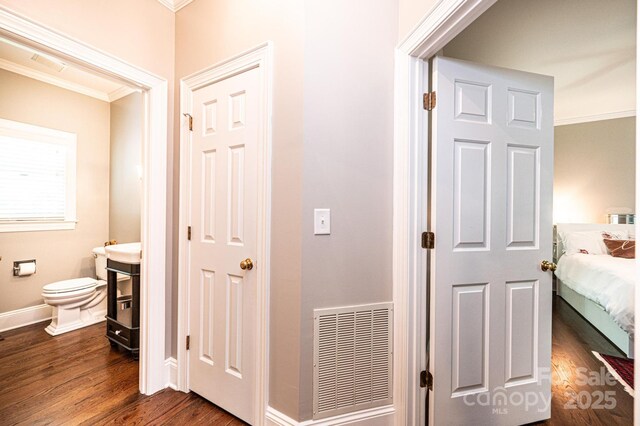 841 16th Avenue Ln NW, Hickory, NC 28601 - ensuite bathroom featuring ornamental molding, wood finished floors, and vanity