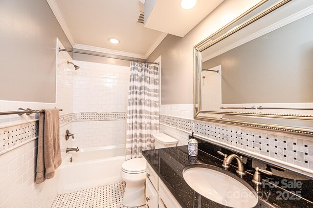 841 16th Avenue Ln NW, Hickory, NC 28601 - bathroom with tile walls, crown molding, shower / bath combo with shower curtain, vanity, and tile patterned floors