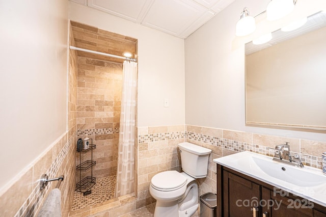 841 16th Avenue Ln NW, Hickory, NC 28601 - bathroom featuring tile walls, vanity, a stall shower, and a wainscoted wall
