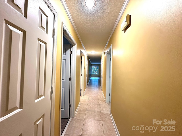 1590 Springpoint Rd Unit B, Rock Hill, SC 29732 - corridor with a textured ceiling, ornamental molding, and light tile patterned flooring