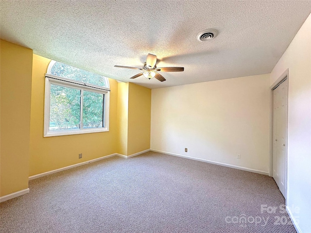 1590 Springpoint Rd Unit B, Rock Hill, SC 29732 - empty room with ceiling fan, carpet flooring, and a textured ceiling