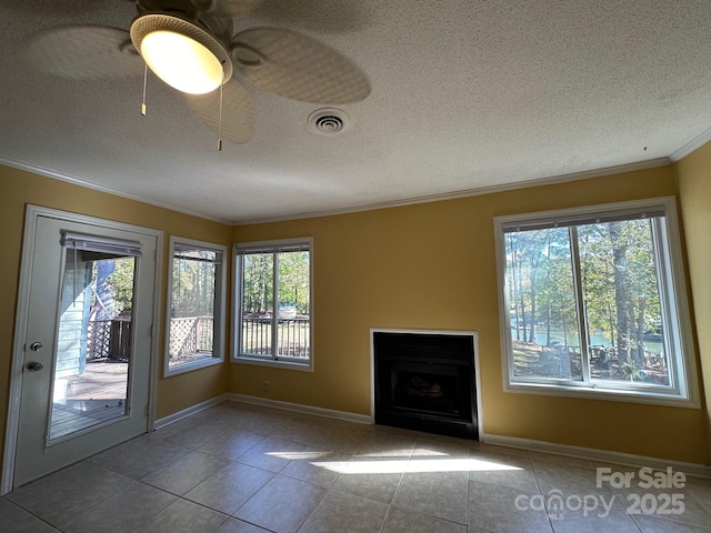 1590 Springpoint Rd Unit B, Rock Hill, SC 29732 - unfurnished living room with healthy amount of natural light, crown molding, a textured ceiling, tile patterned flooring, and a fireplace