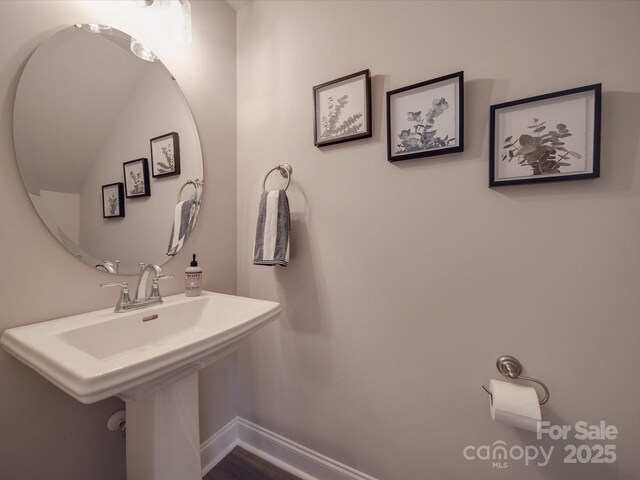 1016 Forest Dr, Marshville, NC 28103 - bathroom with a sink and baseboards