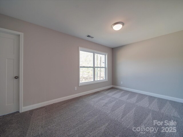 1016 Forest Dr, Marshville, NC 28103 - carpeted spare room featuring baseboards