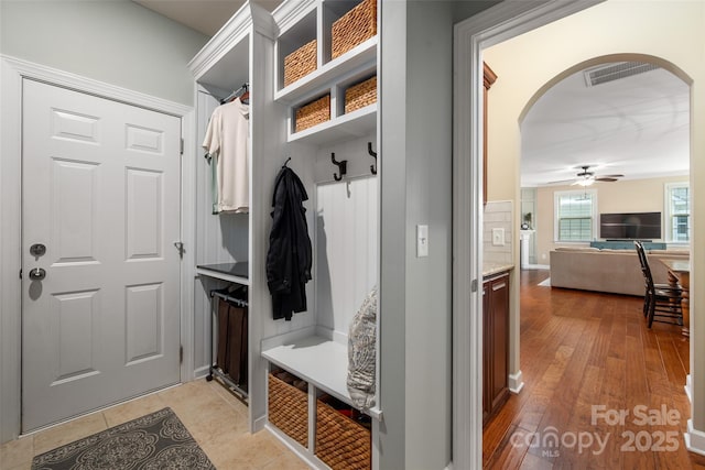 1805 Trading Path Ln, Waxhaw, NC 28173 - mudroom with arched walkways, a ceiling fan, and light wood-style floors