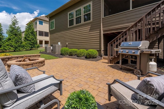 1805 Trading Path Ln, Waxhaw, NC 28173 - view of patio / terrace featuring an outdoor fire pit, stairs, and grilling area