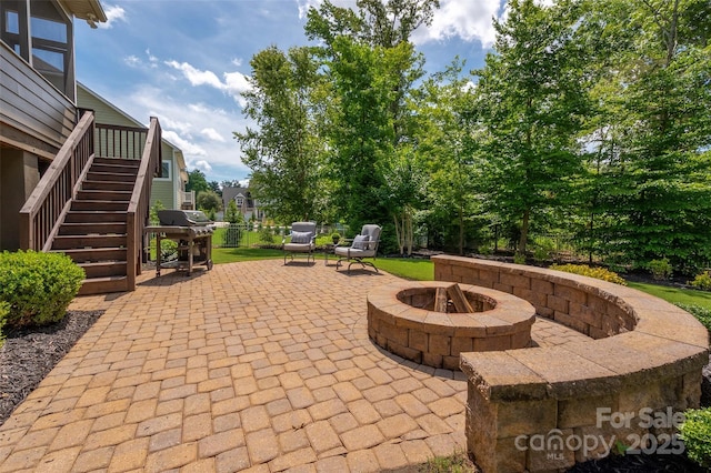 1805 Trading Path Ln, Waxhaw, NC 28173 - view of patio featuring stairs, a fire pit, and grilling area