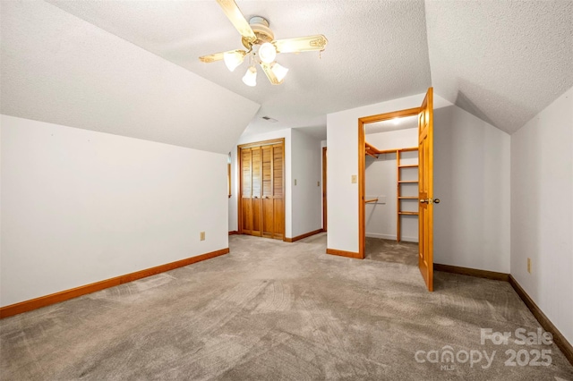 49 Meadowbrook Rd, Rutherfordton, NC 28139 - bonus room featuring lofted ceiling, carpet floors, ceiling fan, and a textured ceiling