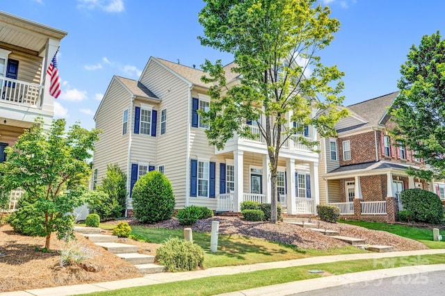 10509 Serape Rd, Charlotte, NC 28277 - view of front facade featuring covered porch and a balcony